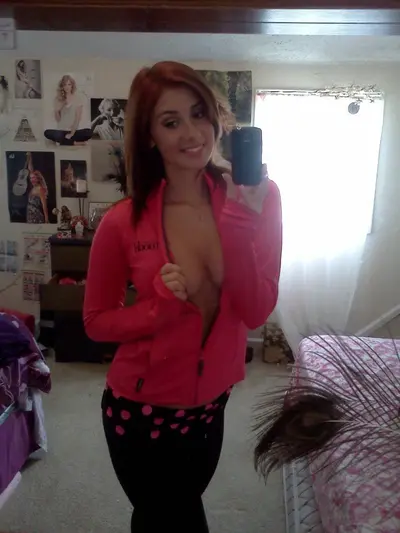 Redhead mirror selfies show off pink bra and tits cover image