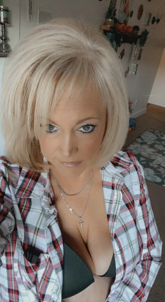 Blonde MILF loves sucking cock and showing tits image 6