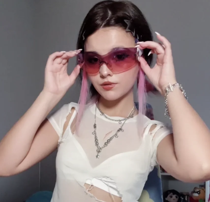 Teen raver girl plays with her tight pussy main image