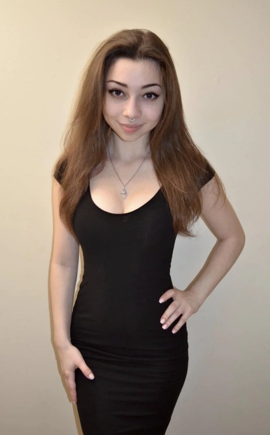 Petite little slut spreads her tight pussy main image