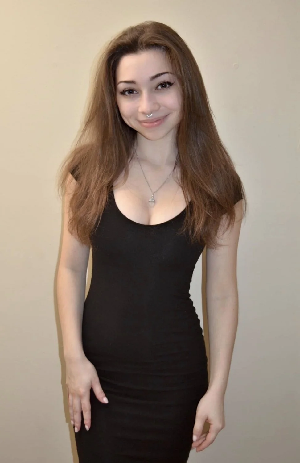 Petite little slut spreads her tight pussy image 2