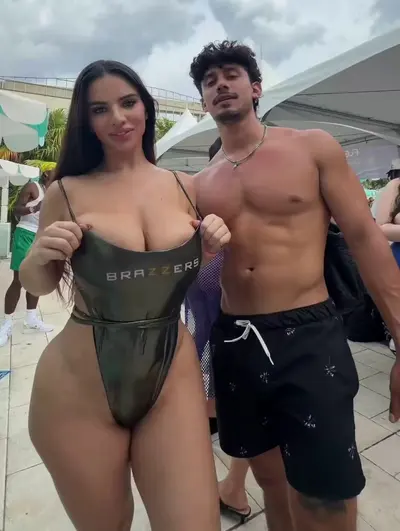 Bro sucking her titties at a hotel pool 😮😍 cover image