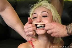 Tiny blonde with braces gets her throat fucked hard image 3