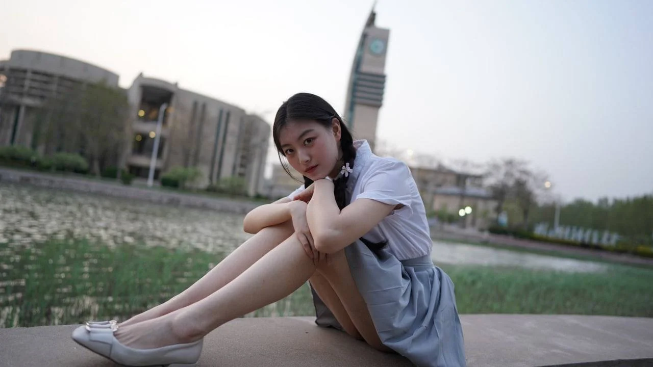 Pretty Asian college girl image 6