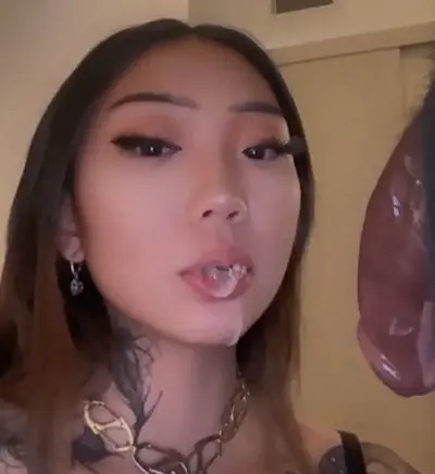Cute asian bitch gives sloppy deepthroat blowjob cover image