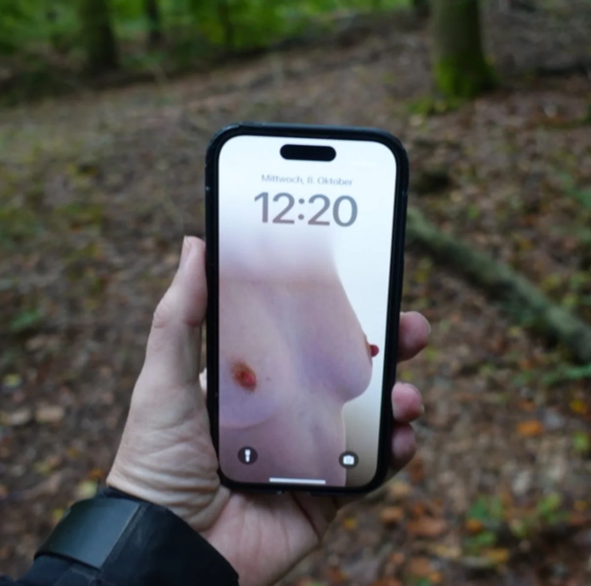 A stranger on erome used my wife's tits as his phone lockscreen in public image 2