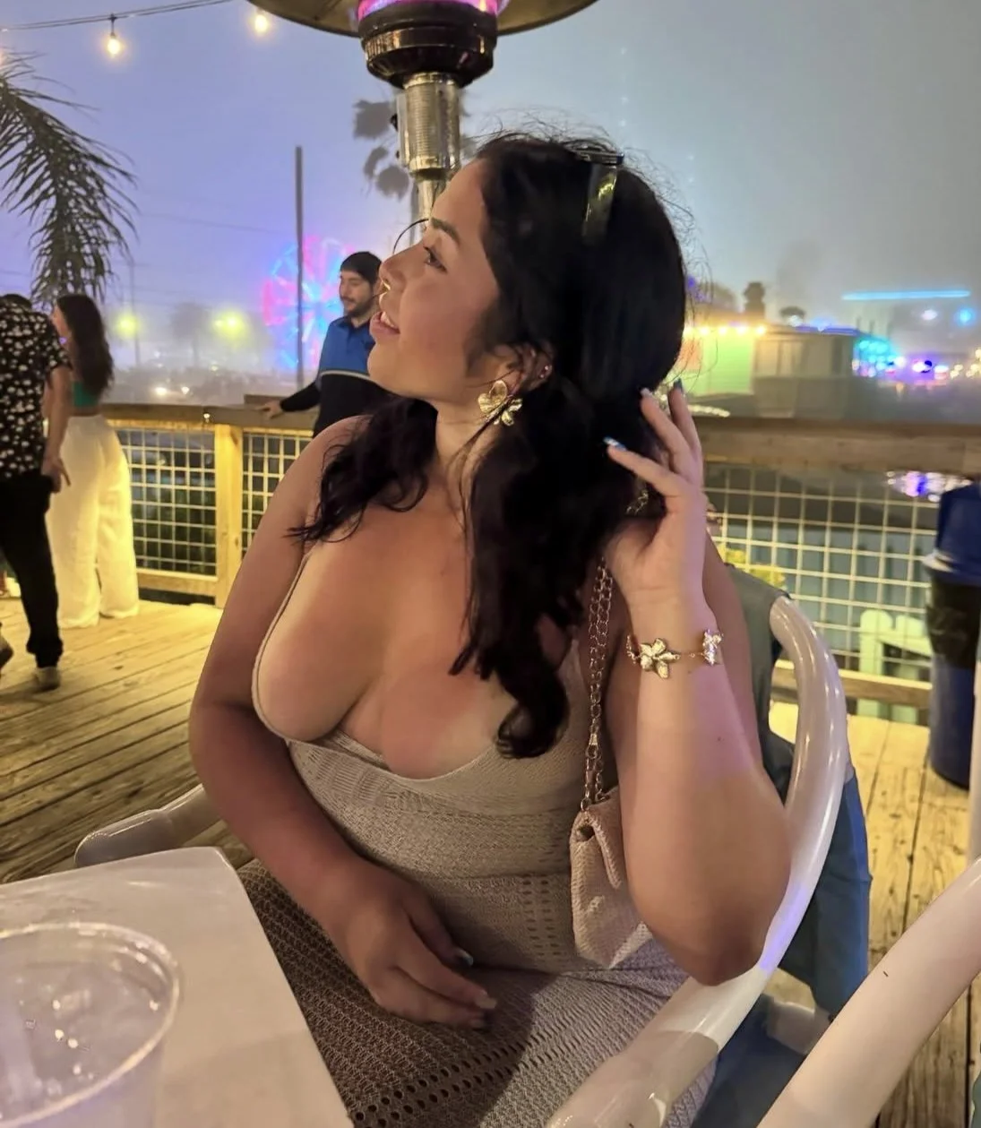 I wonder how her boyfriend felt he saw his girlfriends tits out in public like this… image 4