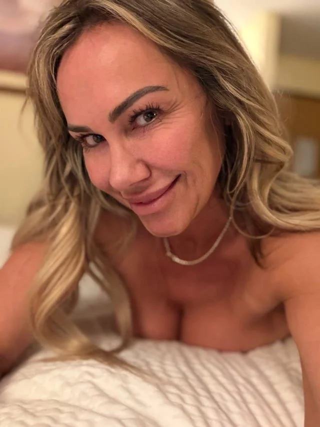 MILF nurse with amazing nipples image 2