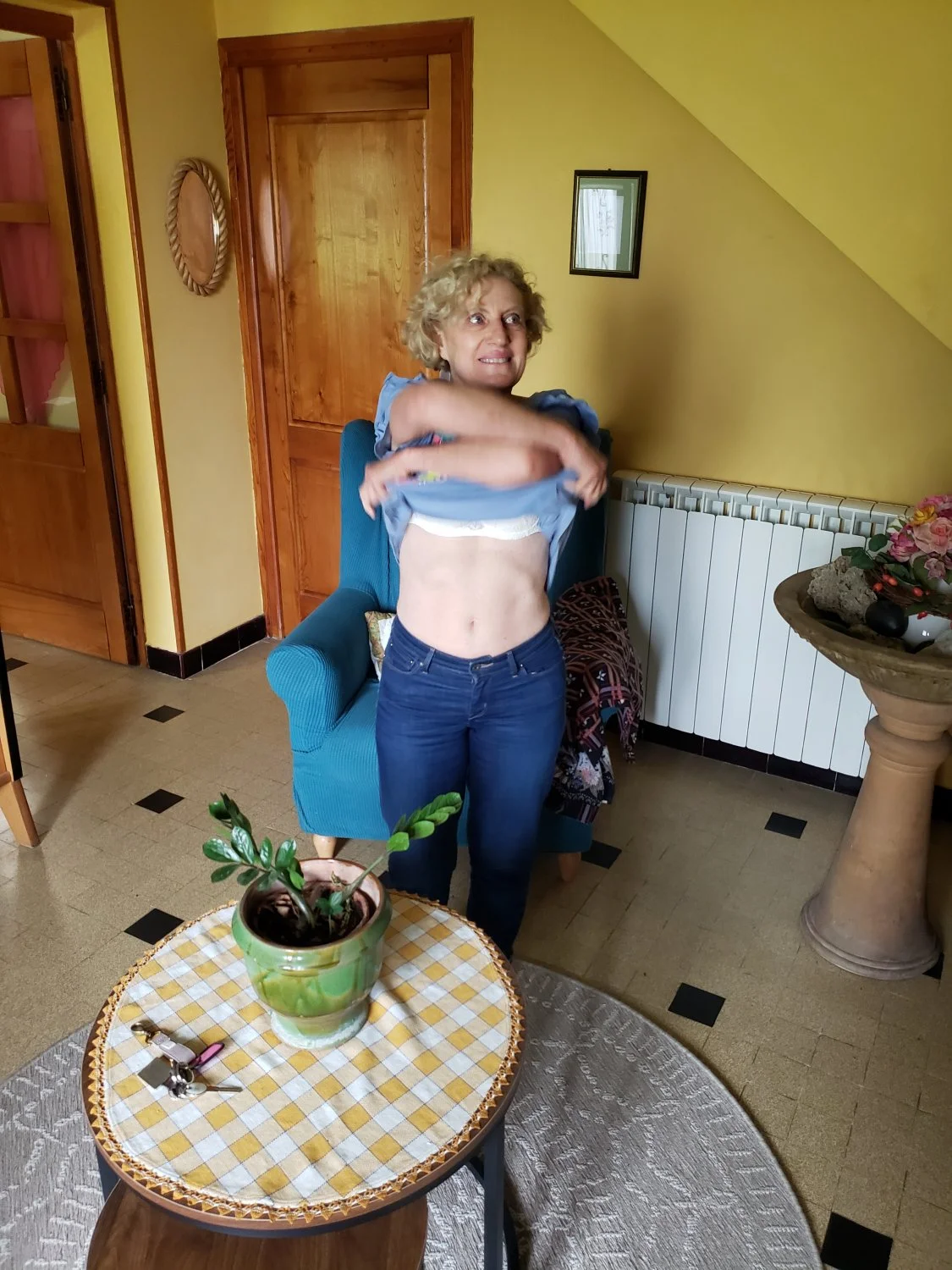 Cheating granny nurse Solange agreeing for another unscheduled strip tease-two photographers main image