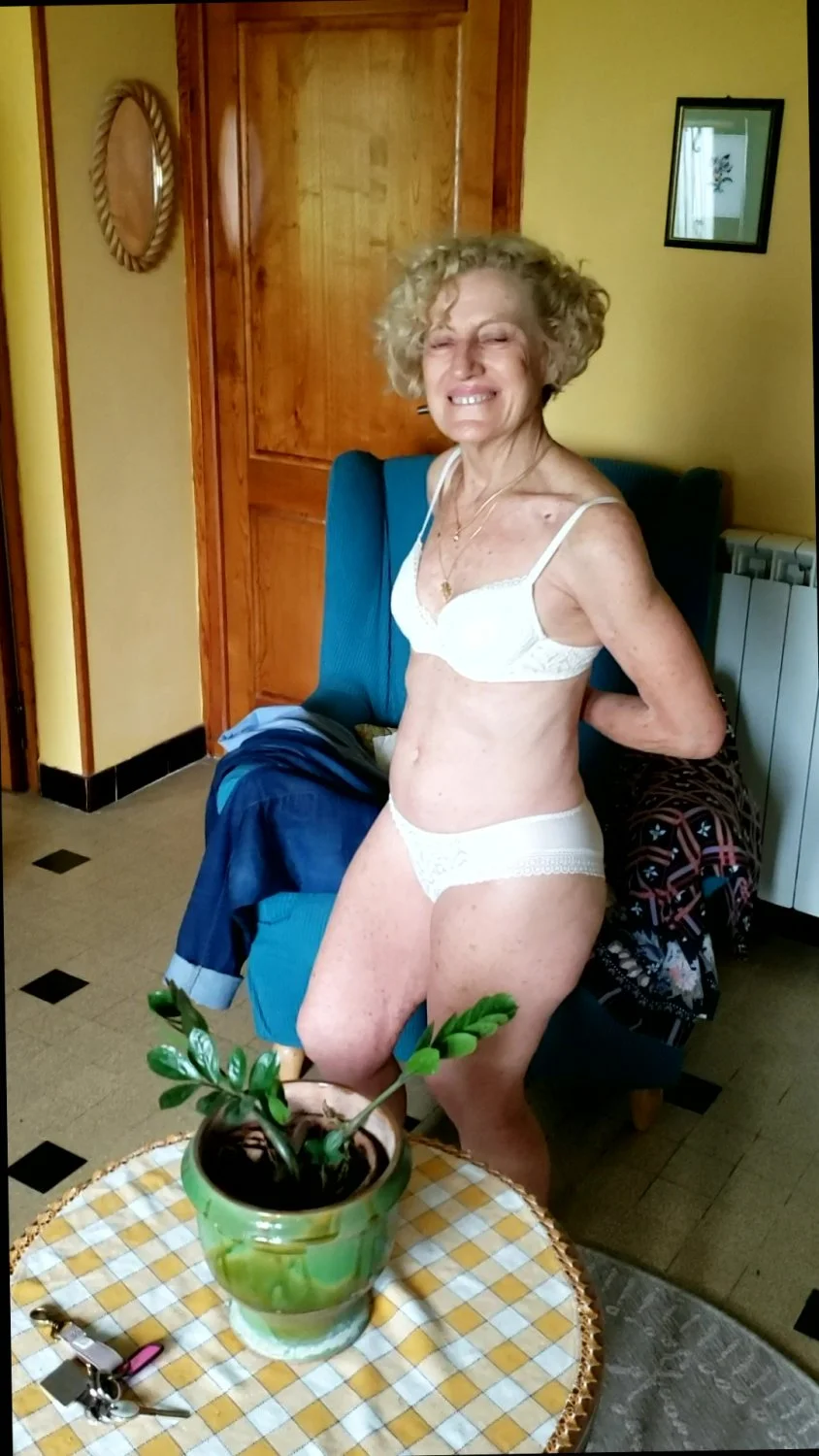 Cheating granny nurse Solange agreeing for another unscheduled strip tease-two photographers image 6