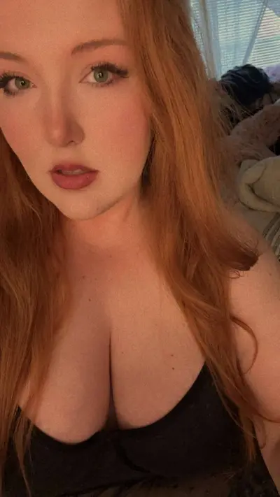 BBW Madeline displaying her udders cover image