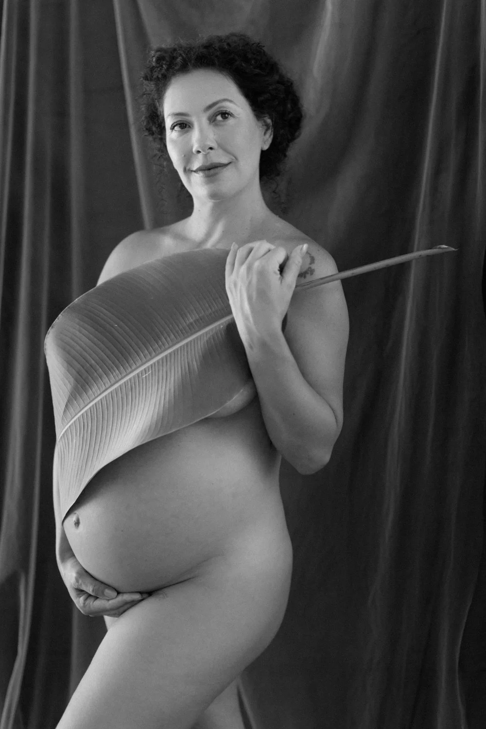 Pregnant MILF image 11