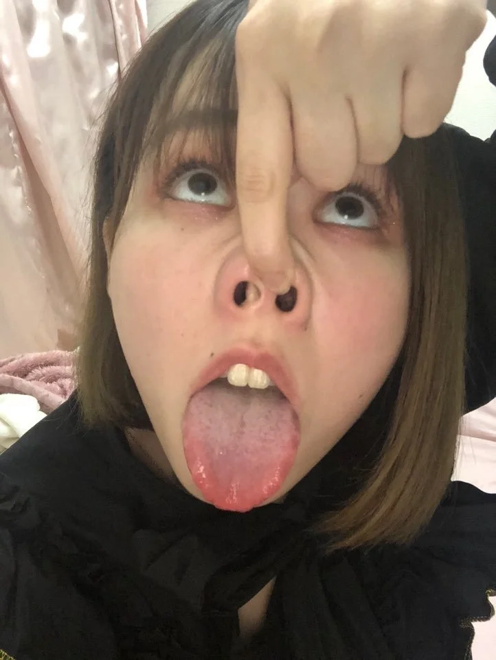 cute japanese woman embraces herself as a humiliating pig image 6