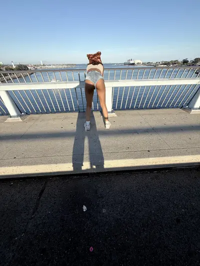 Ebony webslut sells pussy on bridge in Long Beach cover image
