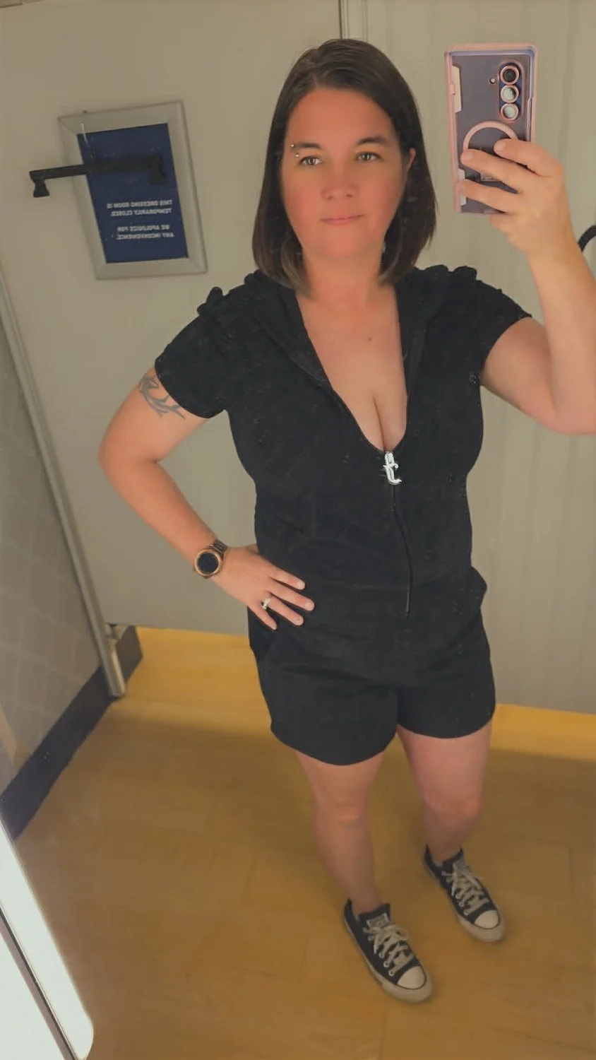 My favorite milf strips in a public changing room image 7