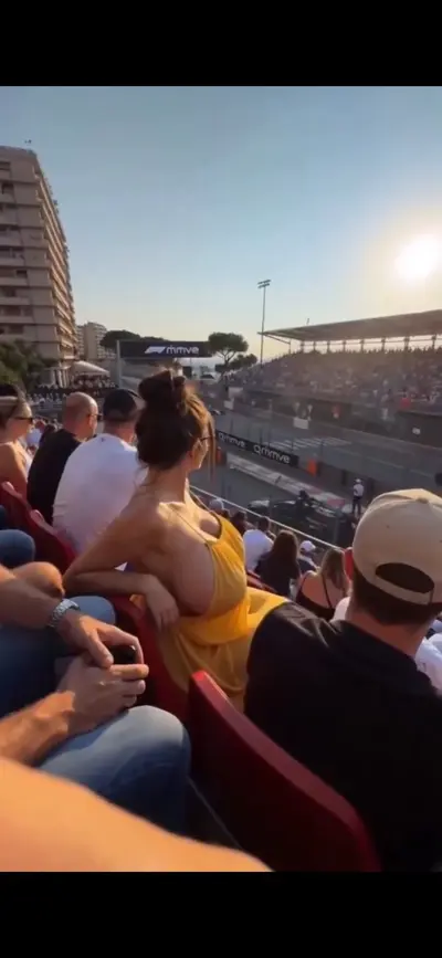 Freaky hot busty milf at F1 Grand Prix - is that real or Ai 🙄 cover image