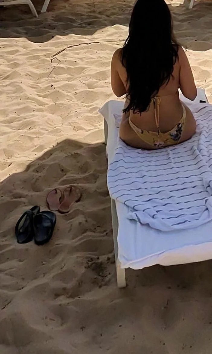 Hotwife on vacation teasing strangers on the beach image 2