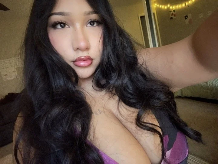Asian slut using her dildo main image