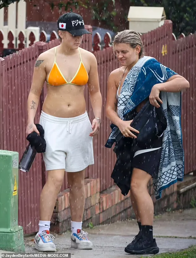 Jojo Siwa pokies in bikini top image 2