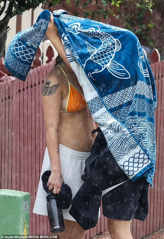 Jojo Siwa pokies in bikini top image 3