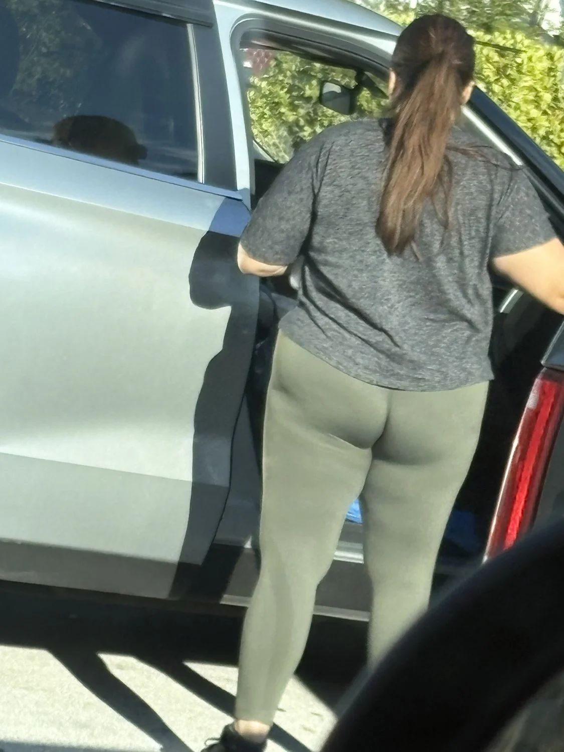 Fat ass MILF in gym pants image 2