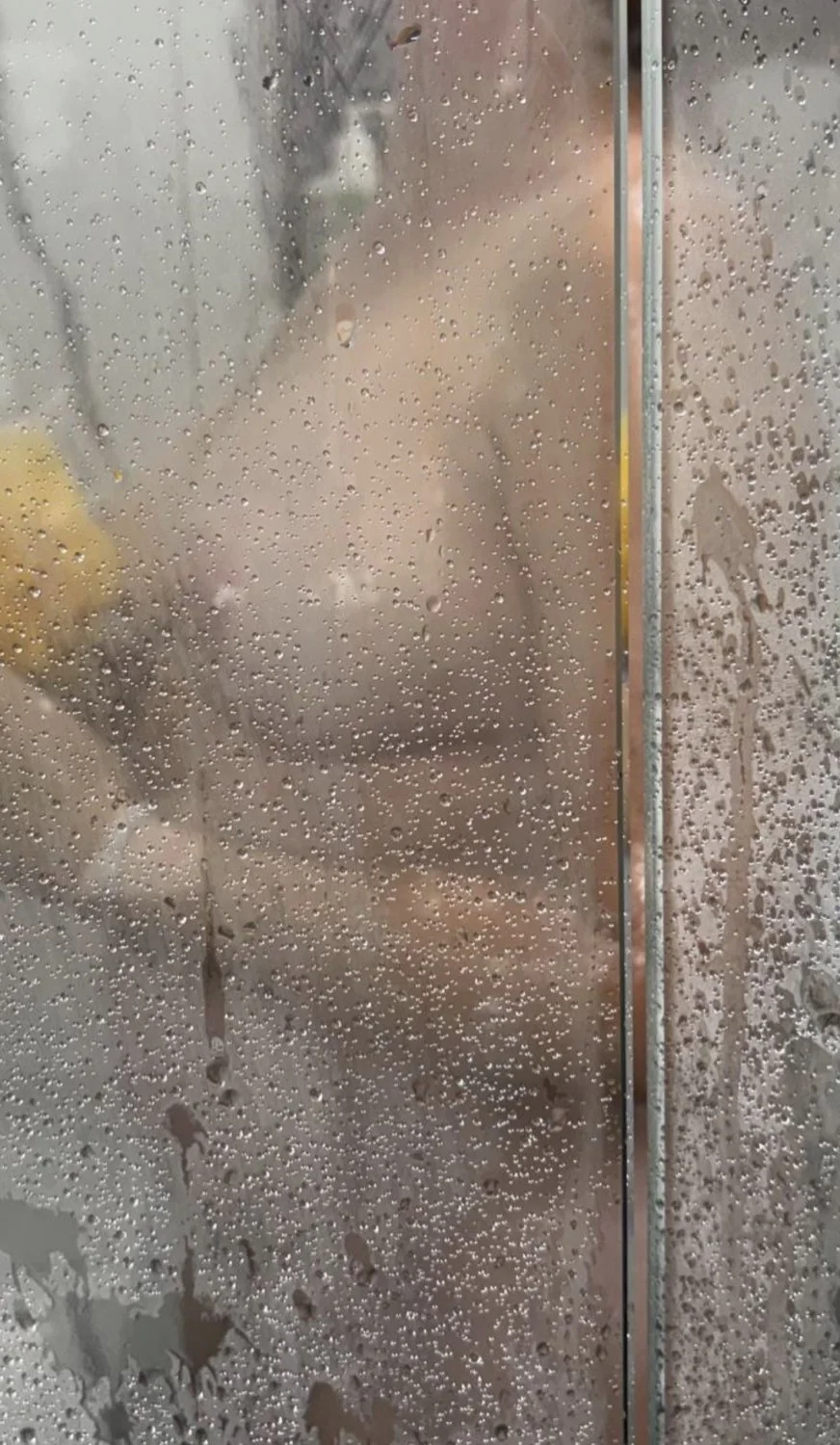 Mature blonde showering image 5