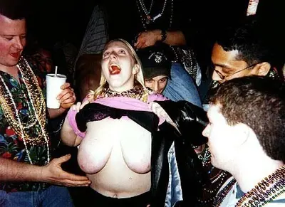 Princip@l Melissa shows off her lovely lady lumps at Mardi Gras cover image