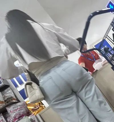 fat ass latina mommy in jeans ass pops out through the jeans cover image