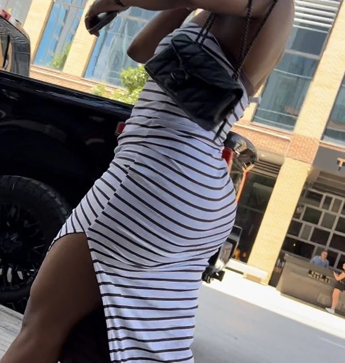 Thick ebony in white dress image 2
