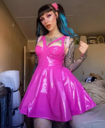 Sexy bimbo in pink PVC dress cover image