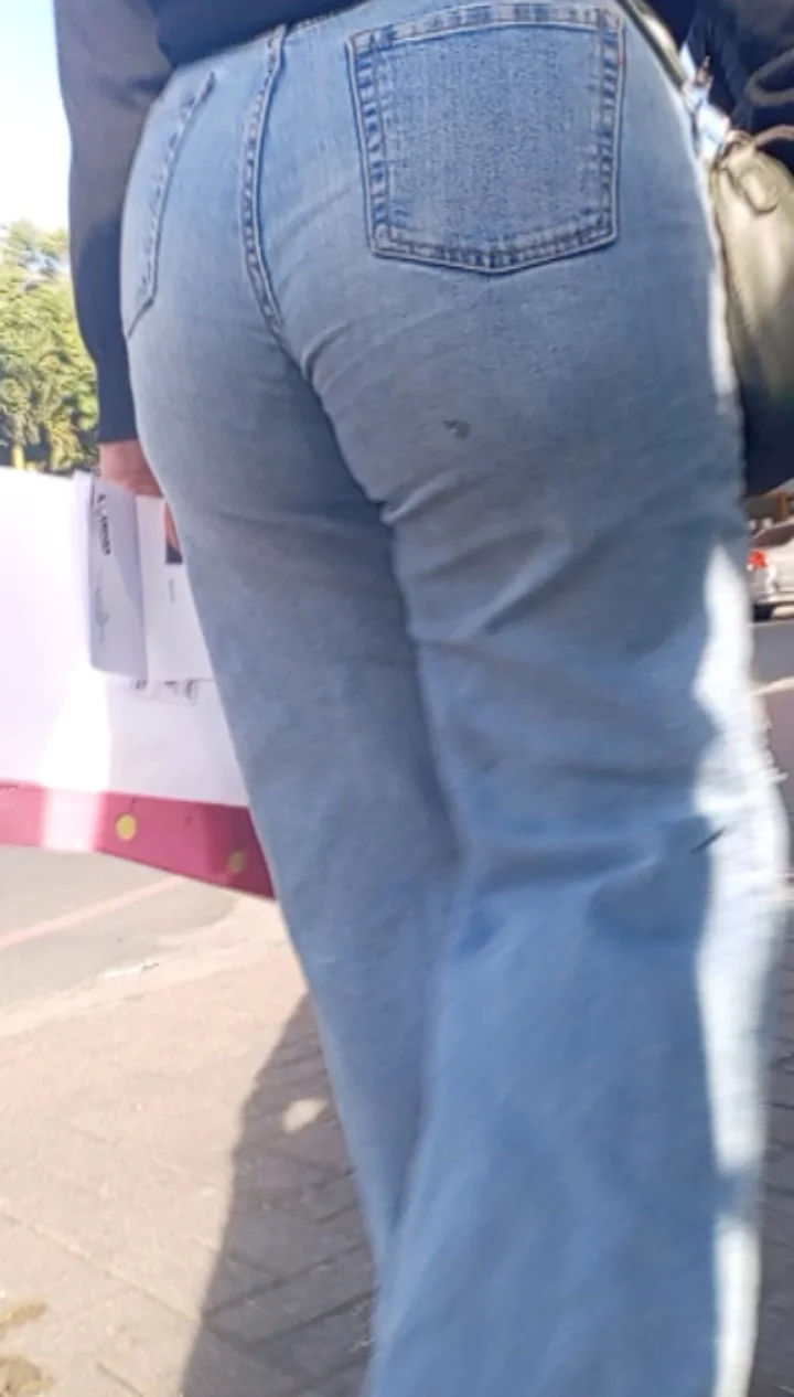 Girl in jeans public main image