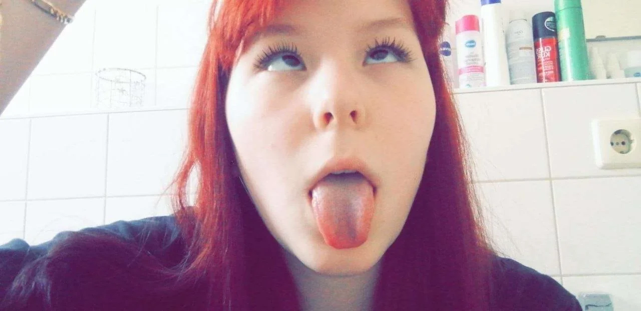 Red hair German slut Leonie wants you to cum on her tongue and tits image 4