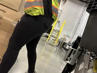 Coworker ass in black jeans cover image