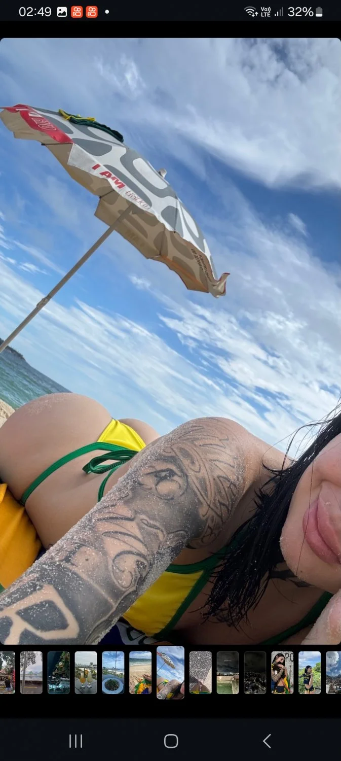 Novinha tatuada de fil dental image 1