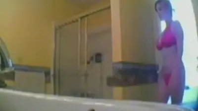 Very busty teen showing some pussy and ass on hidden cam cover image