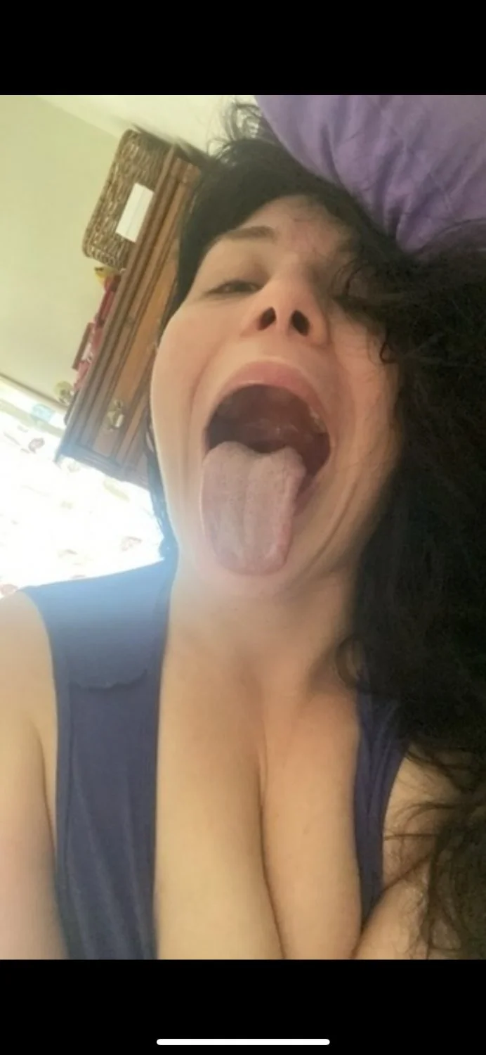 Long tongue sexy white slut image 2