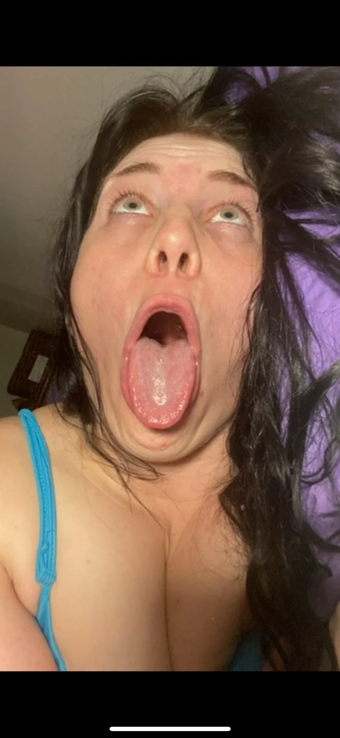 Long tongue sexy white slut image 3
