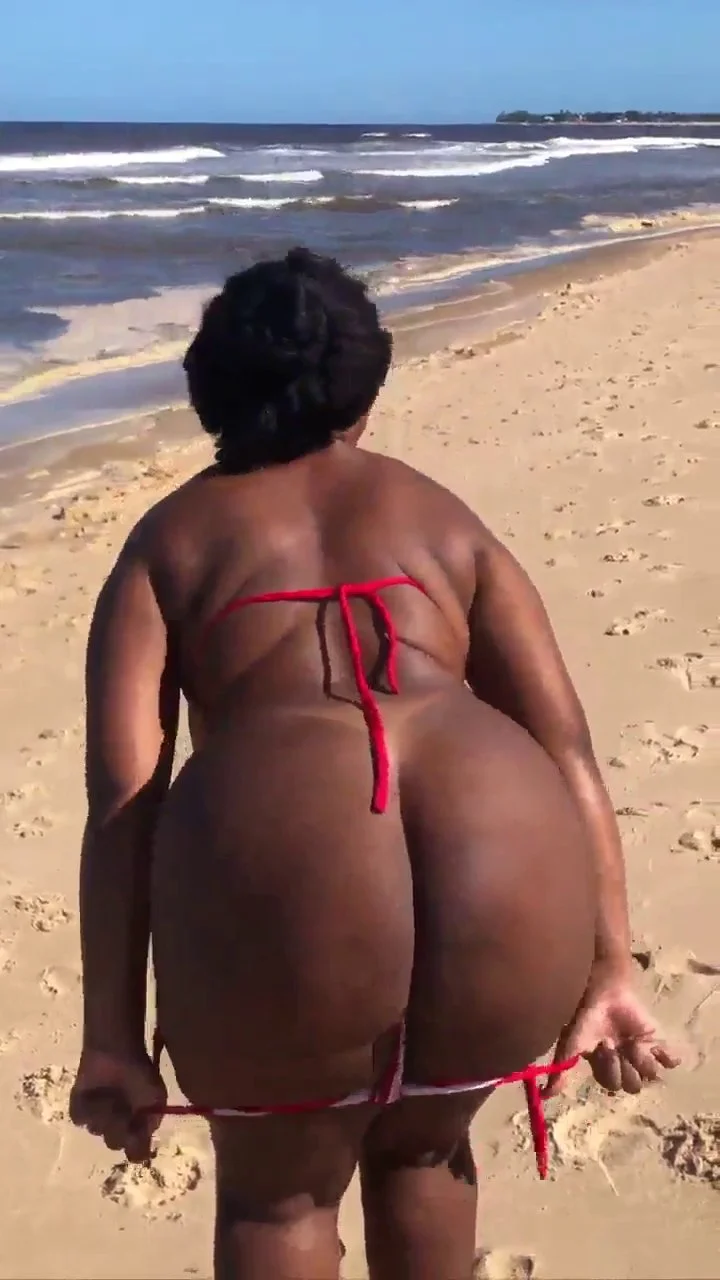 Brazilian MILF gets naked at public beach 😍 image 2