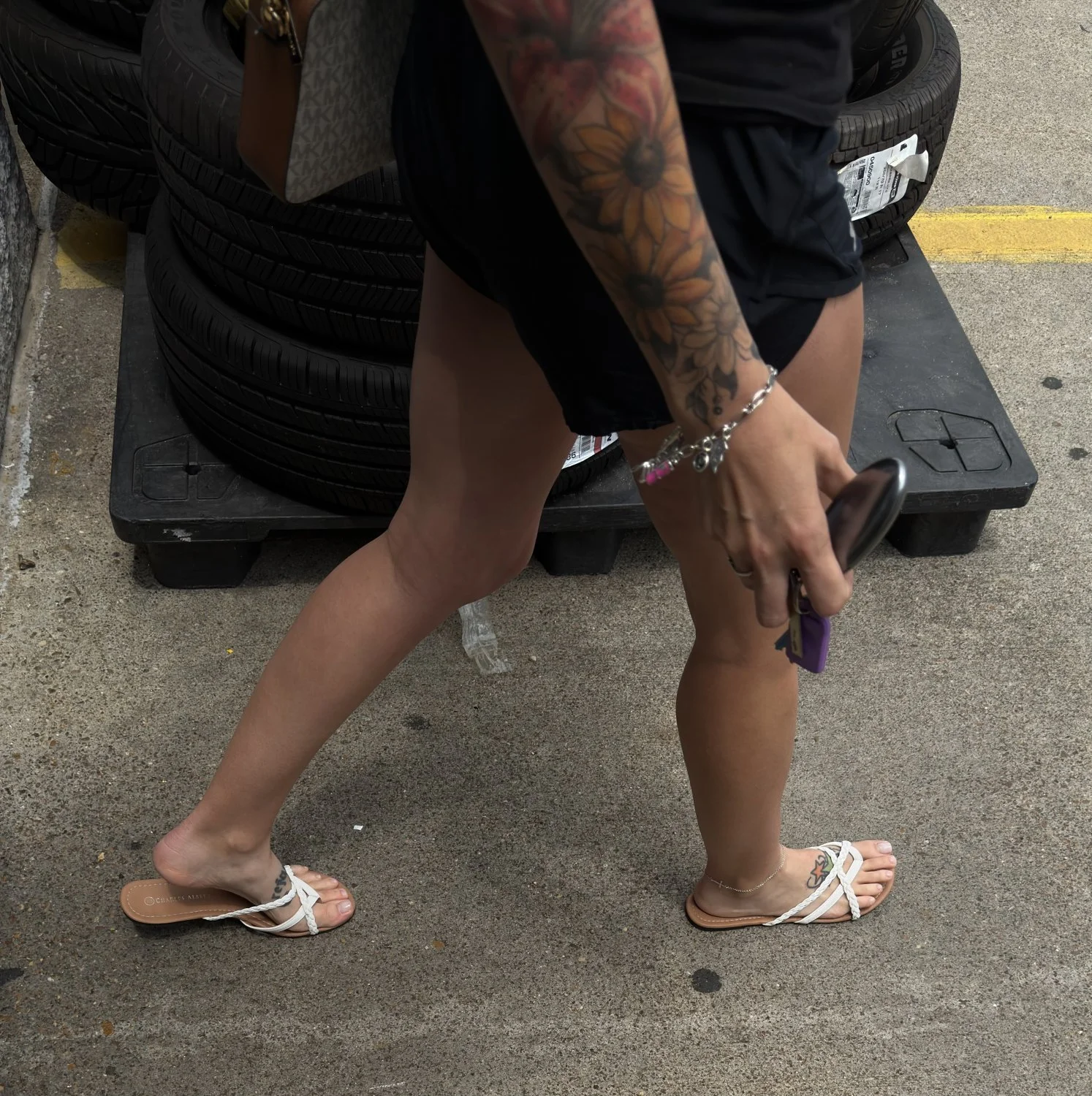 MILFS tattooed feet in sandals image 14