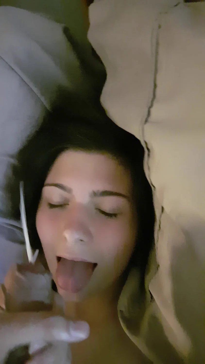 cute brunette takes a facial image 17