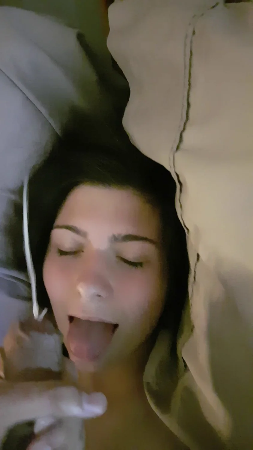 cute brunette takes a facial image 18