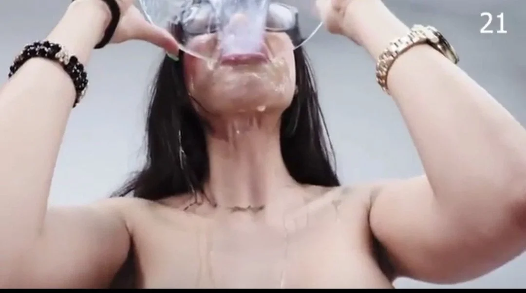 Beautiful Spanish brunette swallows over 21 loads of cum in a bukkake session. image 9