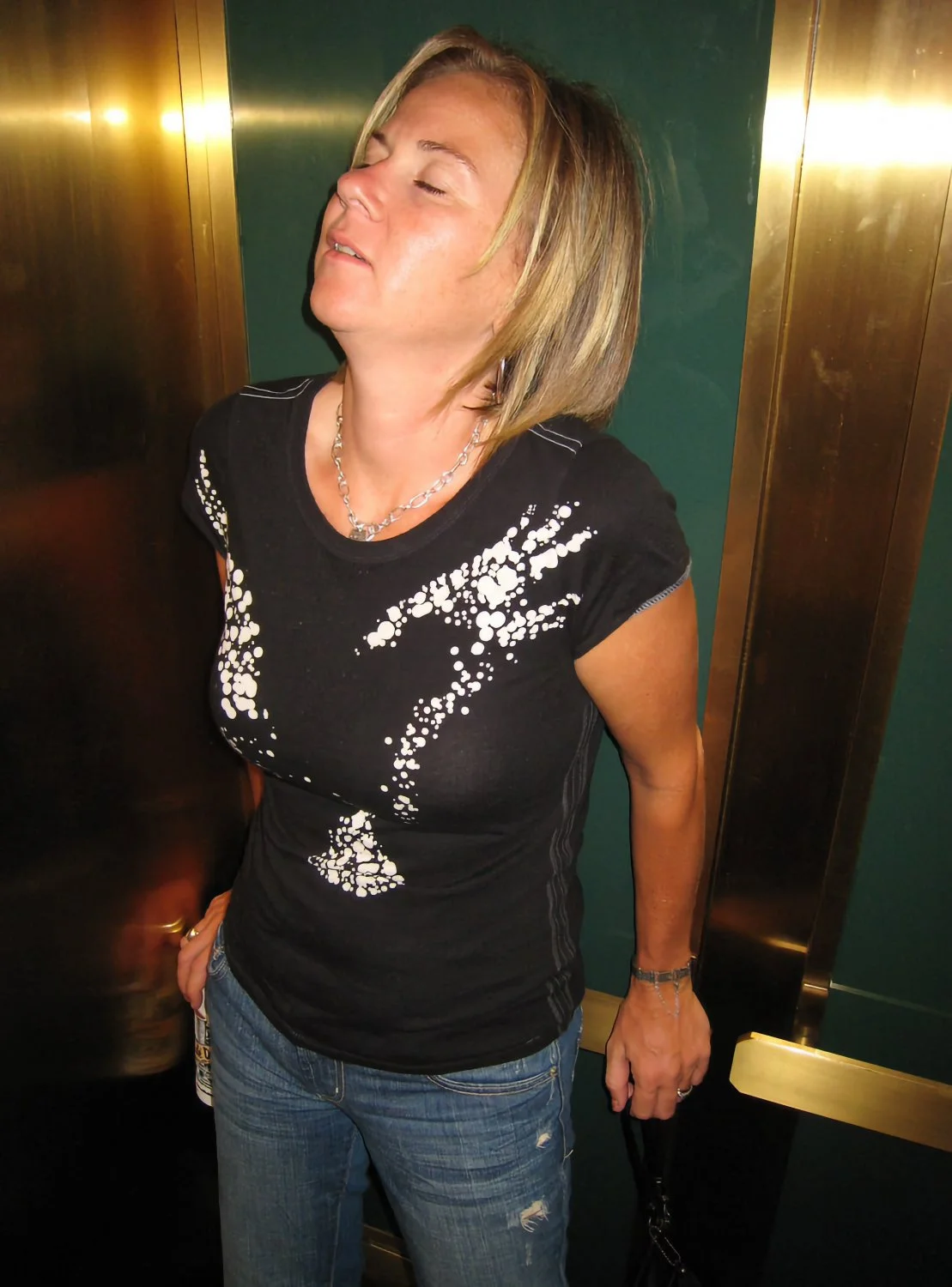 Kylie nude again in Omni Royal Orleans hotel hallway New Orleans main image