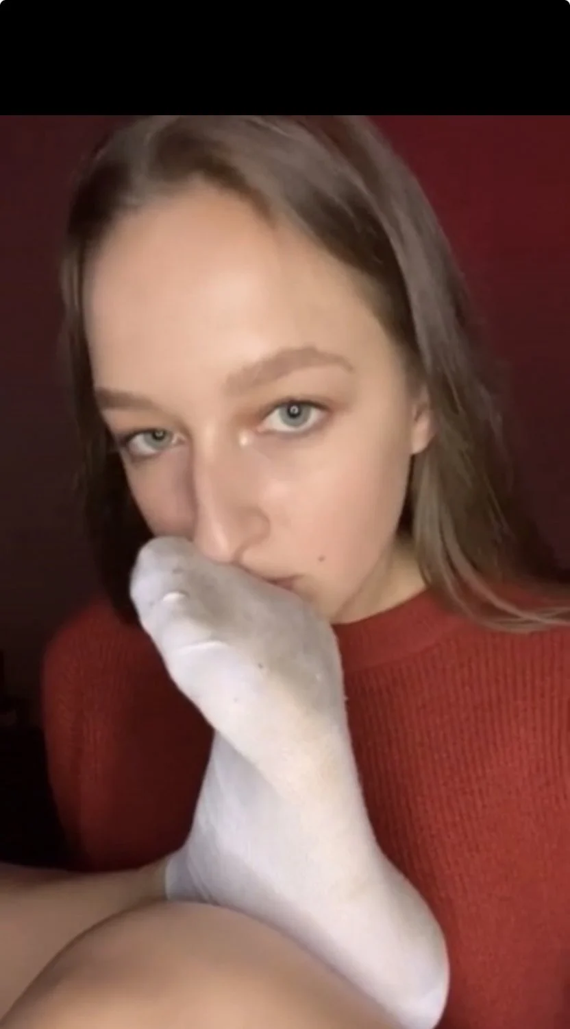 Sniffing and licking dirty sock main image