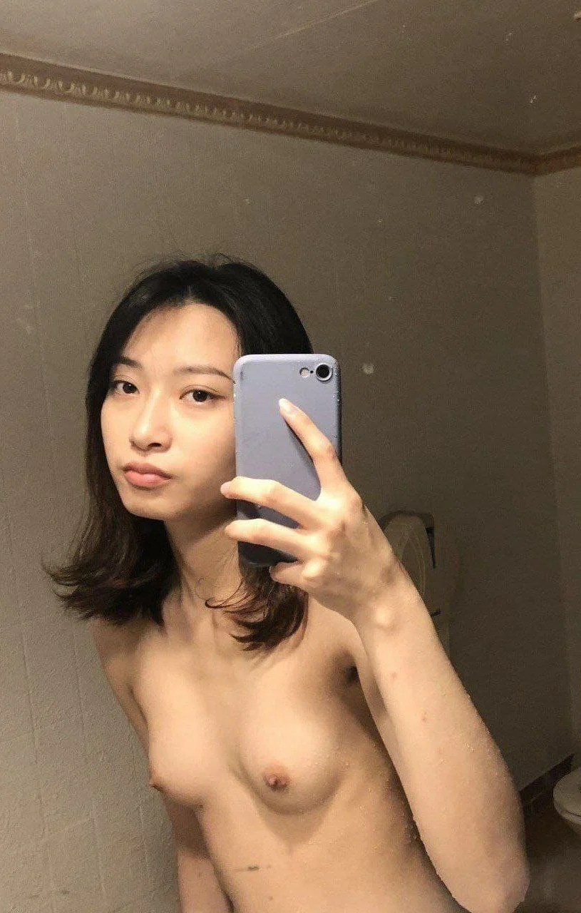 Beautiful Asian college student enjoys her private life well image 6