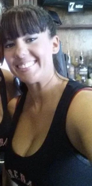 Military wife Jacquelyn blushes as she shows off her awesome tits for a crappy shirt in public image 13