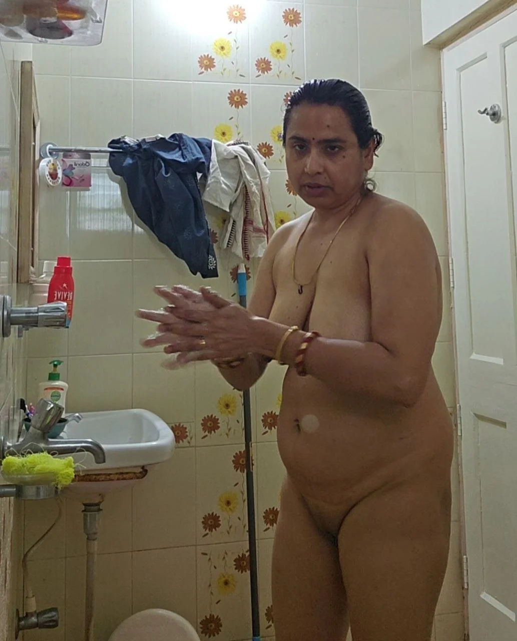 Indian mom caught nude showering by son image 11