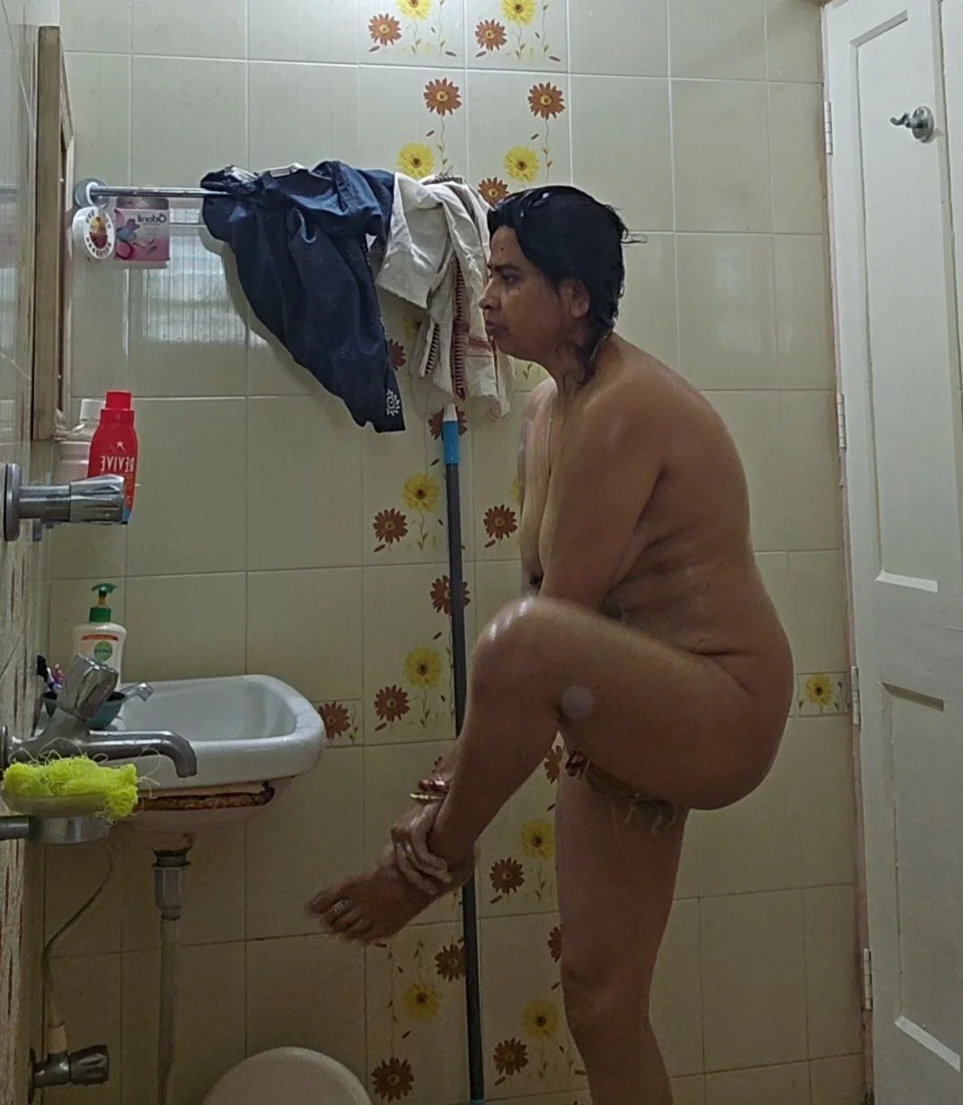 Indian mom caught nude showering by son image 3