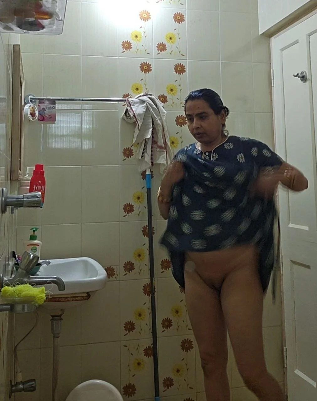 Indian mom caught nude showering by son image 5