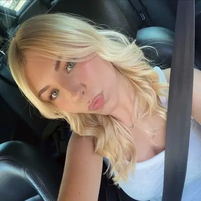 Sexy blondie teen in the car cover image